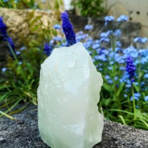 Raw, pale Green Calcite crystal.  Adds pure serenity to your room!