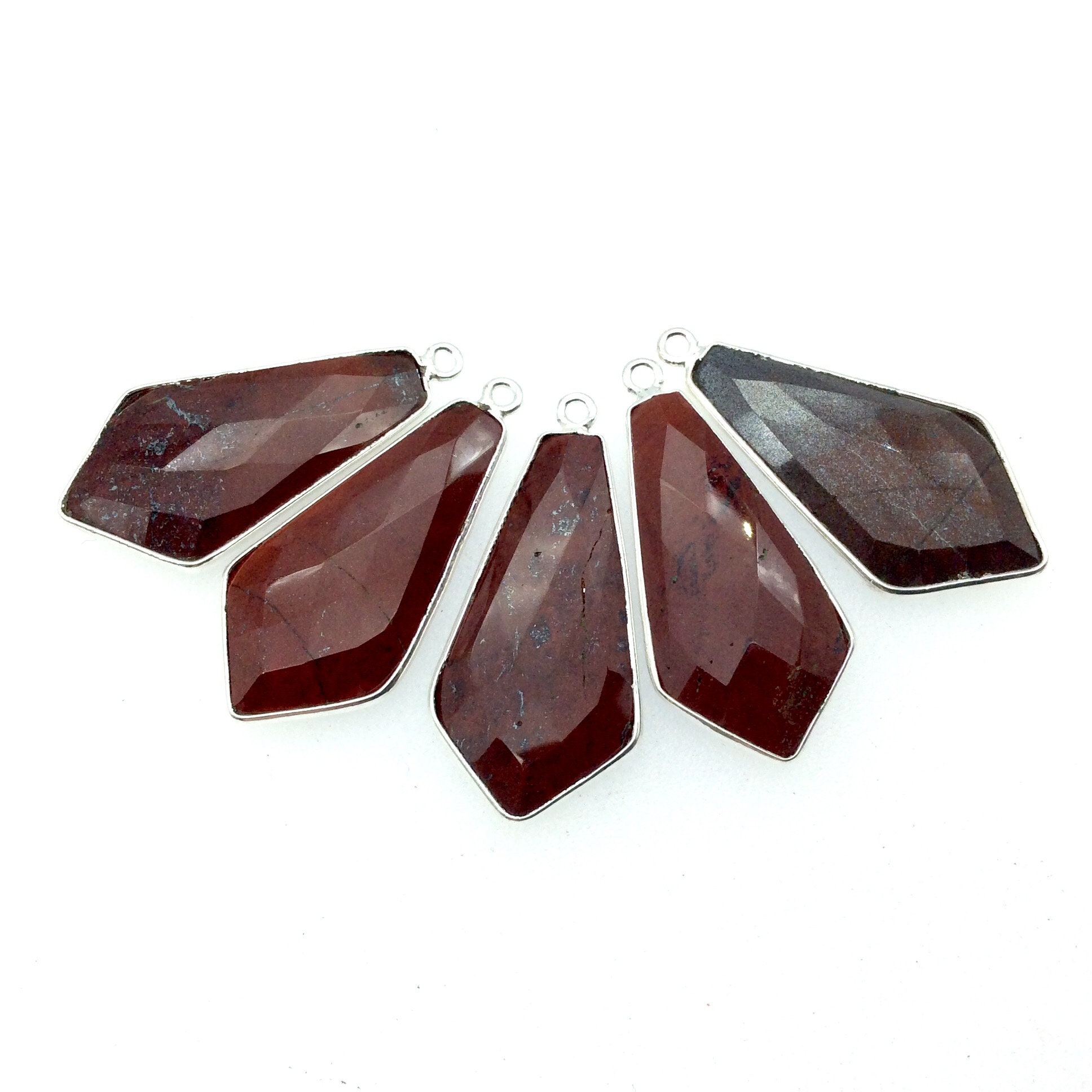 Faceted Red Jasper Dagger Pendant – Silver Plated Copper Bezel (15mm X 30mm) Faceted Red Jasper Dagger Pendant – Silver Plated Copper Bezel (15mm X 30mm)