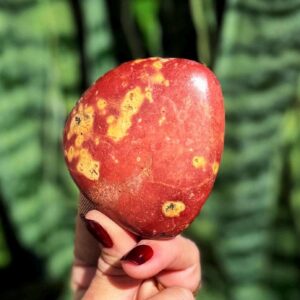 Red Jasper crystal palm stone - for grounding, vitality, and motivation