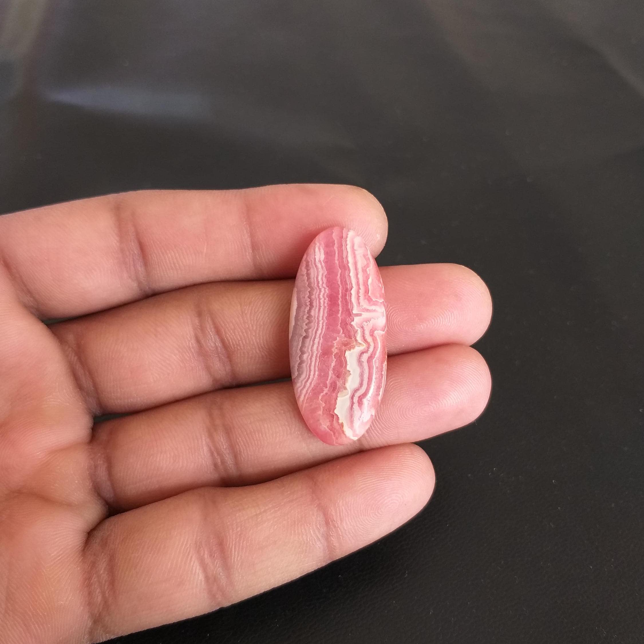 Oval Rhodochrosite Cabochon: 45 Carat Gemstone (38x17x5 Mm
