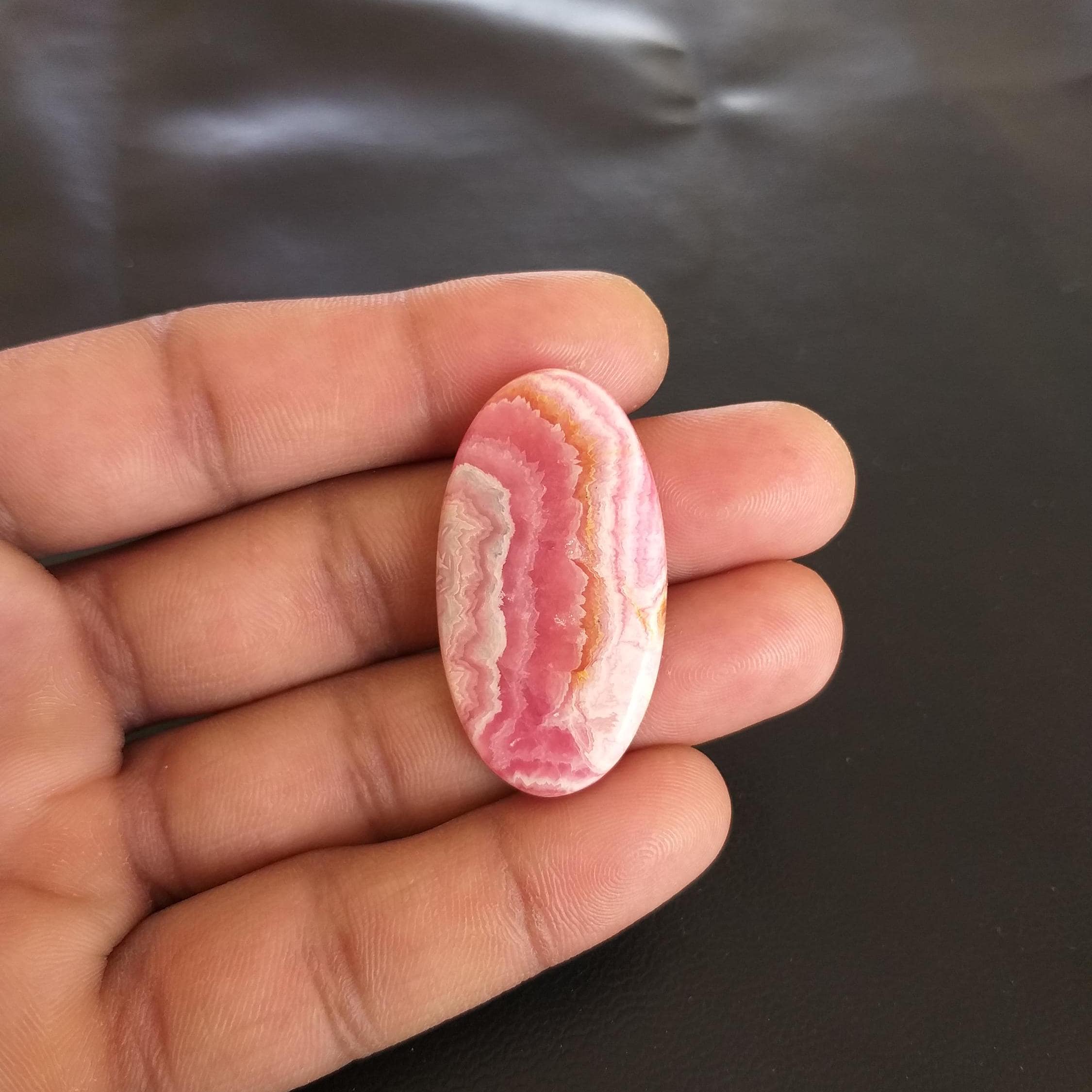 Oval Rhodochrosite Cabochon: 60 Carat Gemstone, 40x22x6 Mm