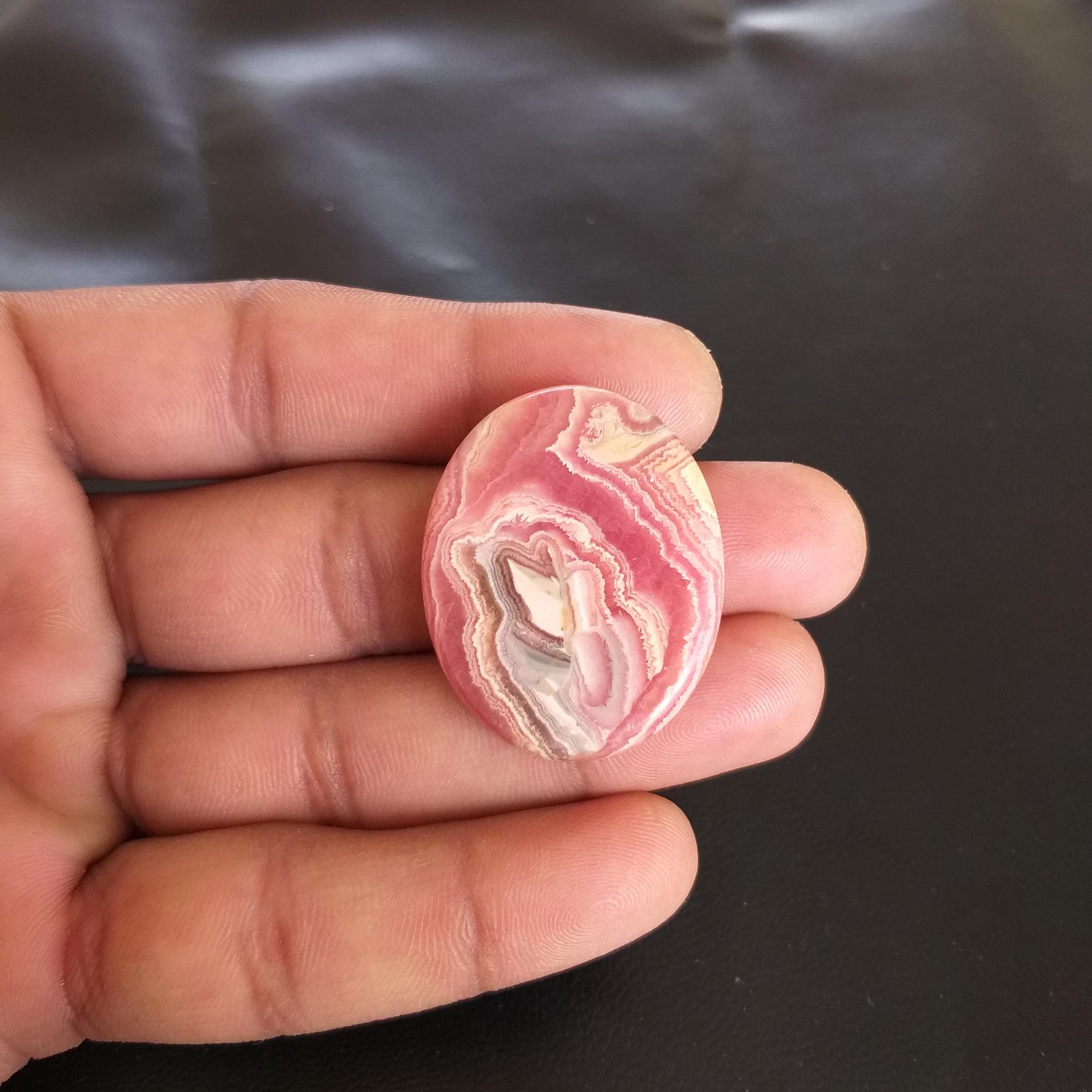 Oval Rhodochrosite Cabochon: 72.5 Carat Gemstone, Aaa Quality