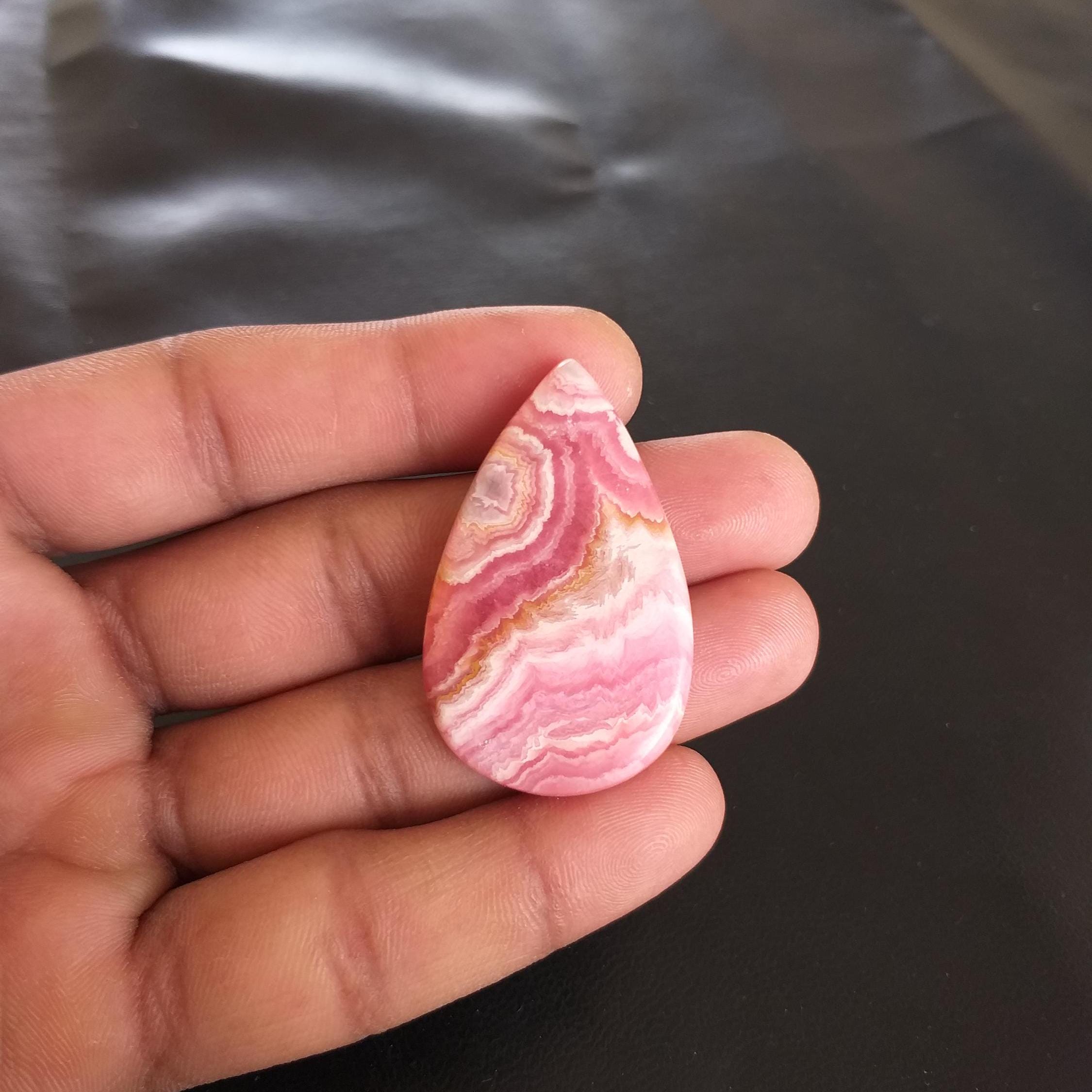 Rhodochrosite Stone Cabochon: Pear Shape Gemstone, 75 Carat (45x27x6 Mm