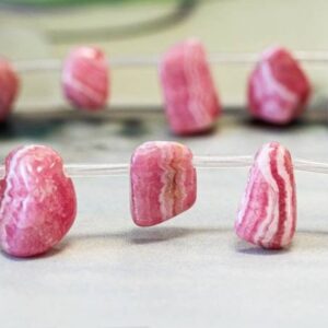 Rhodochrosite 10-16mm Nugget Drop 15.5" Strand Size Varies Rhodochrosite 10-16mm Nugget Drop 15.5" Strand Size Varies