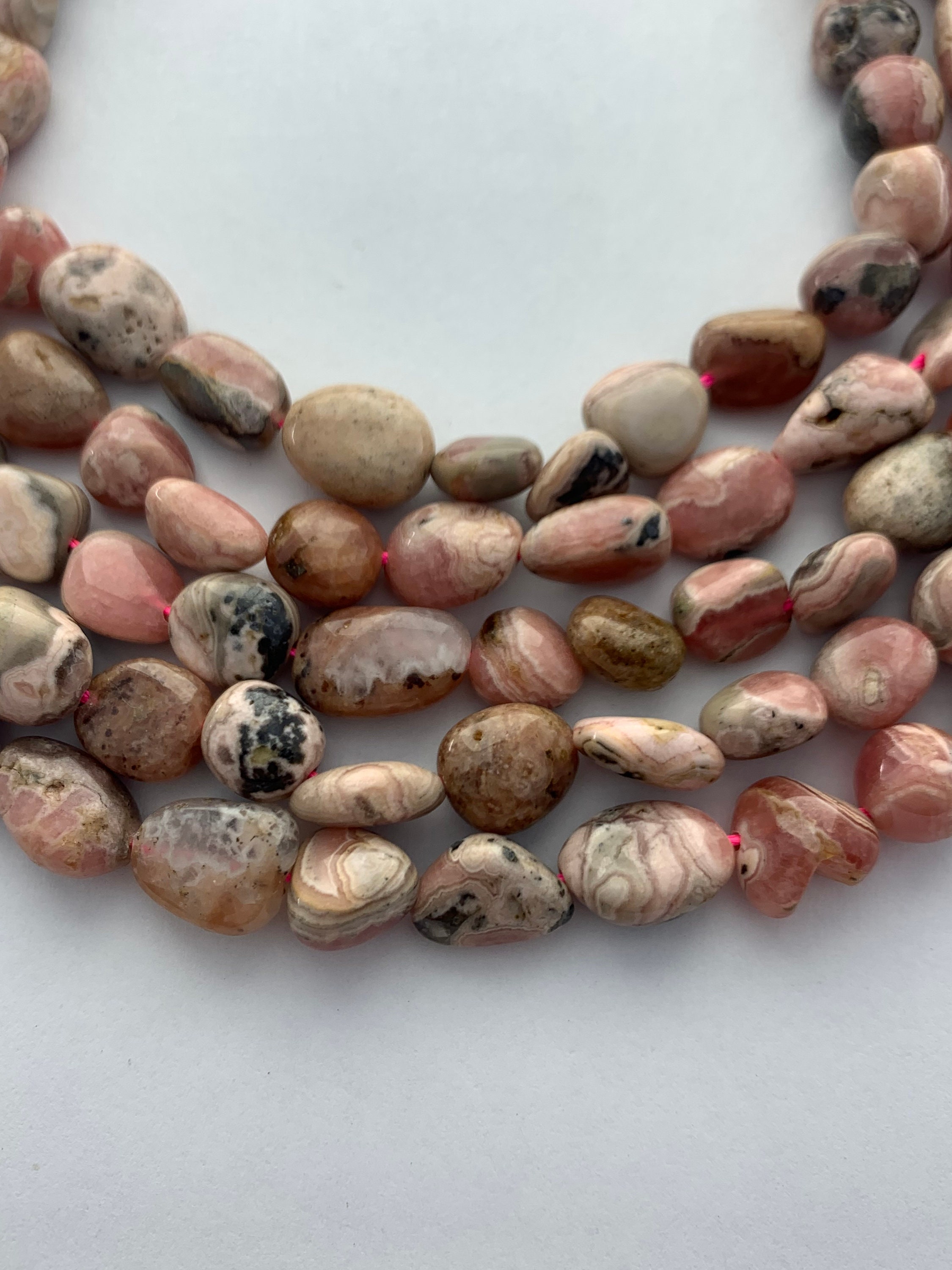 8-10mm Rhodochrosite Gemstone Nugget Beads. 15” Strand Of Pink Nuggets, Approx. 40 Beads Per Strand. 8-10mm Rhodochrosite Gemstone Nugget Beads. 15” Strand Of Pink Nuggets, Approx. 40 Beads Per Strand.