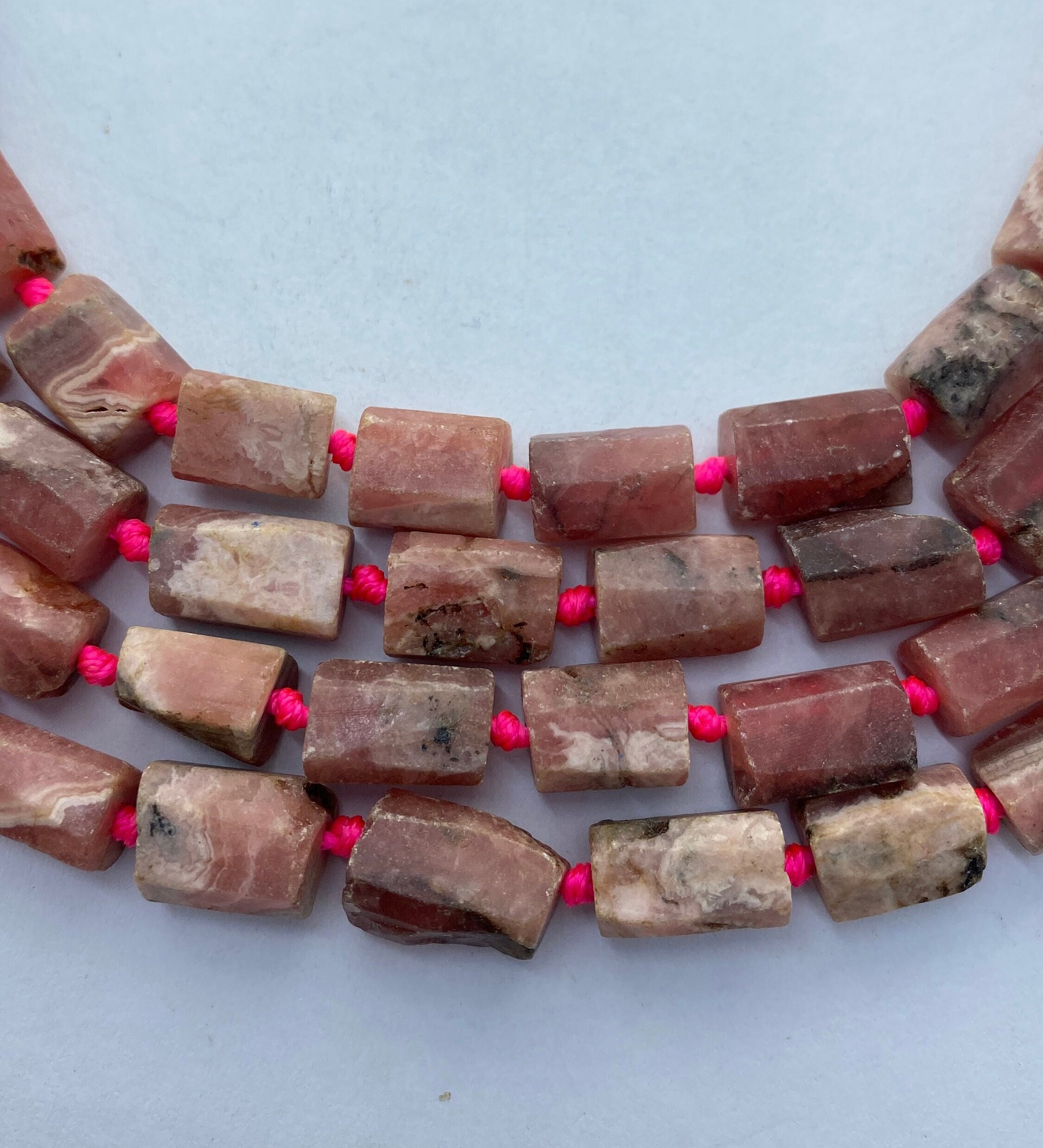 Raw Tubular Rhodochrosite Gemstone Beads. 15” Strands Of Tubular Nuggets, Approx. 32 Per Strand.