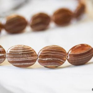 Brown Rhodochrosite 15x20mm Flat Oval Beads 16" Strand Brown Rhodochrosite 15x20mm Flat Oval Beads 16" Strand