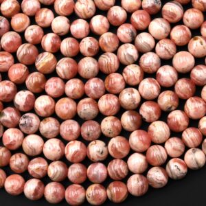 Natural Pink Red Rhodochrosite 5mm 6mm Smooth Polished Round Beads 15.5" Strand Natural Pink Red Rhodochrosite 5mm 6mm Smooth Polished Round Beads 15.5" Strand