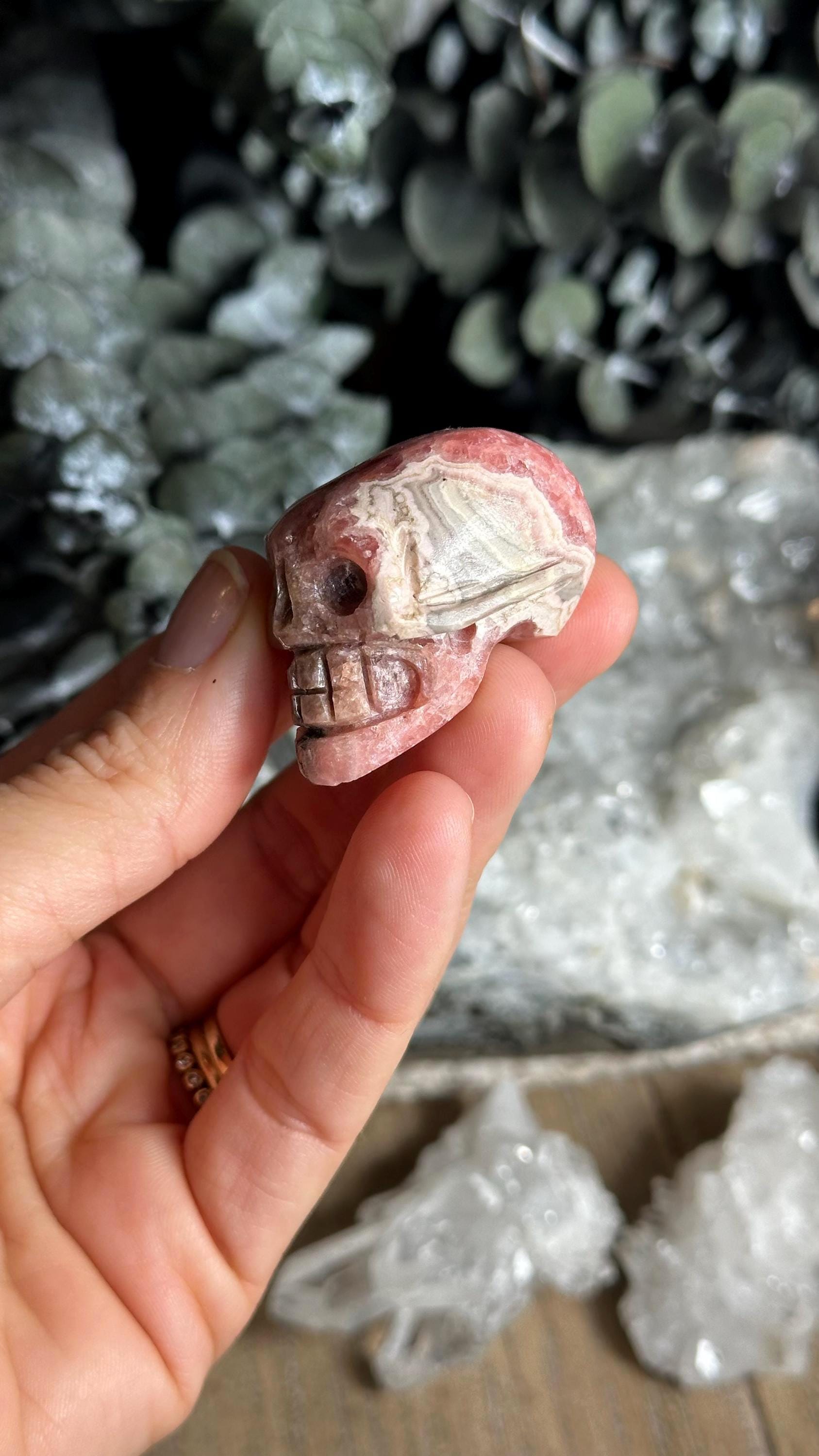 Rhodochrosite Crystal Skull: Carved Gemstone Skull