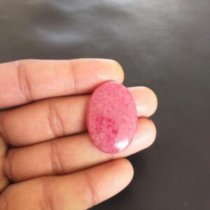 Oval Rhodonite Cabochon: 47.6 Carat Gemstone, 33x23x6 mm