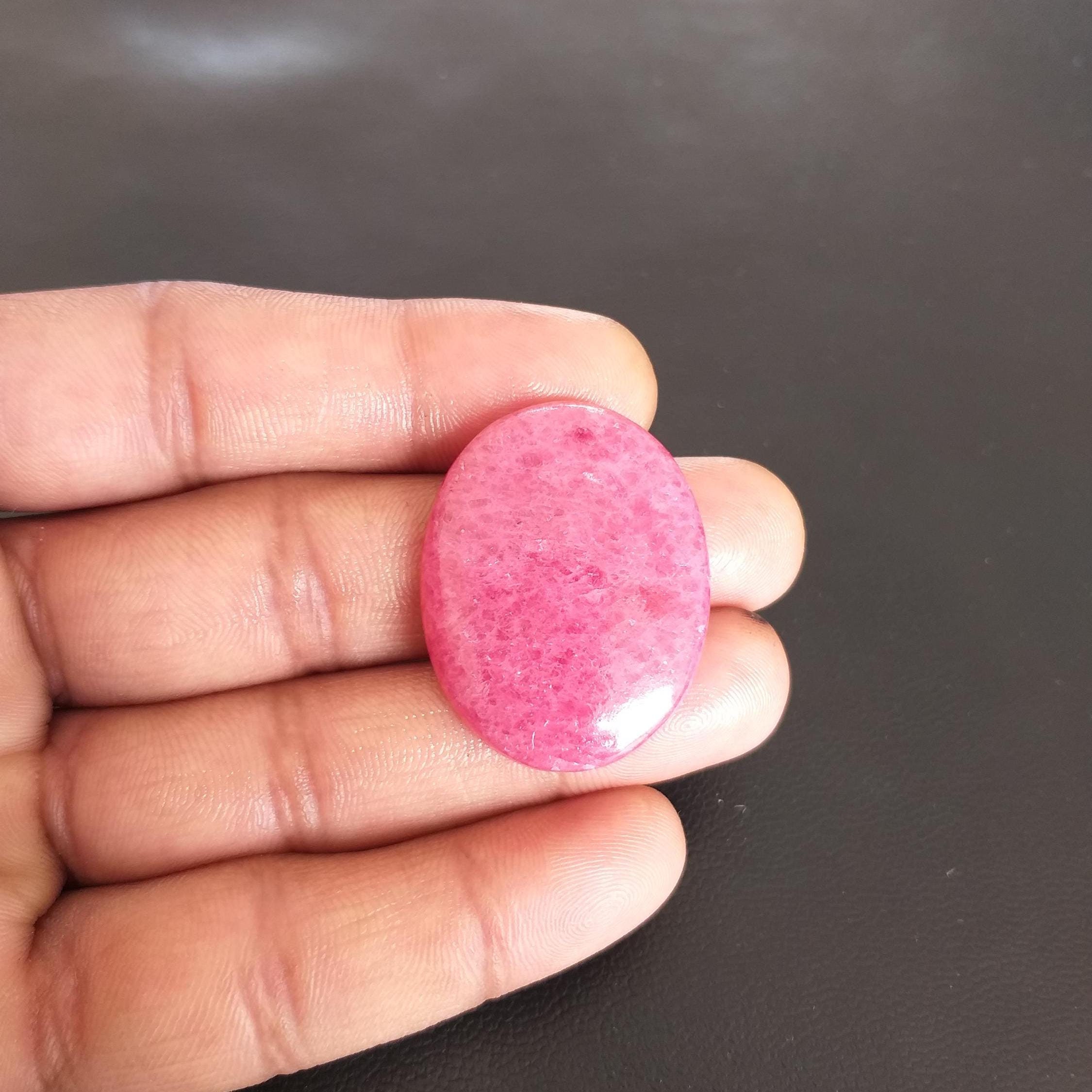 Oval Rhodonite Cabochon: 60.5 Carat Gemstone, 35x27x6 Mm