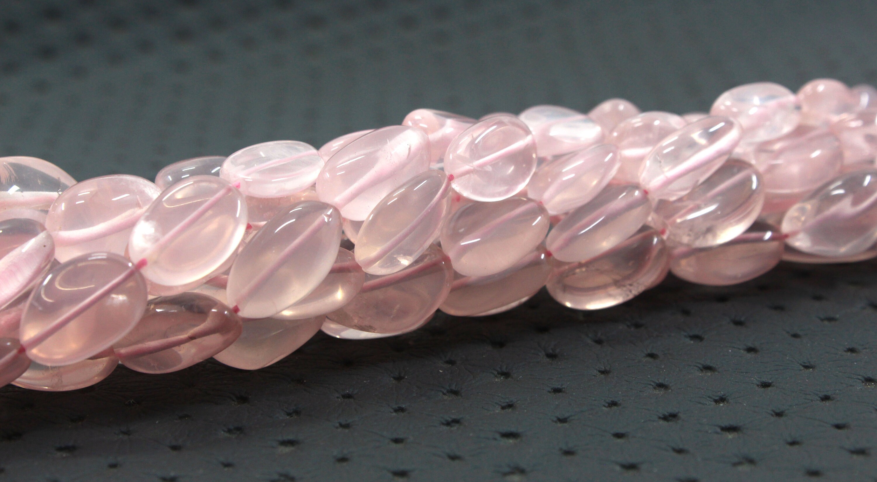 Natural Rose Quartz Briolette Beads: Smooth Oval Gemstone Strand (7x10-8x14 Mm) Natural Rose Quartz Briolette Beads: Smooth Oval Gemstone Strand (7x10-8x14 Mm)