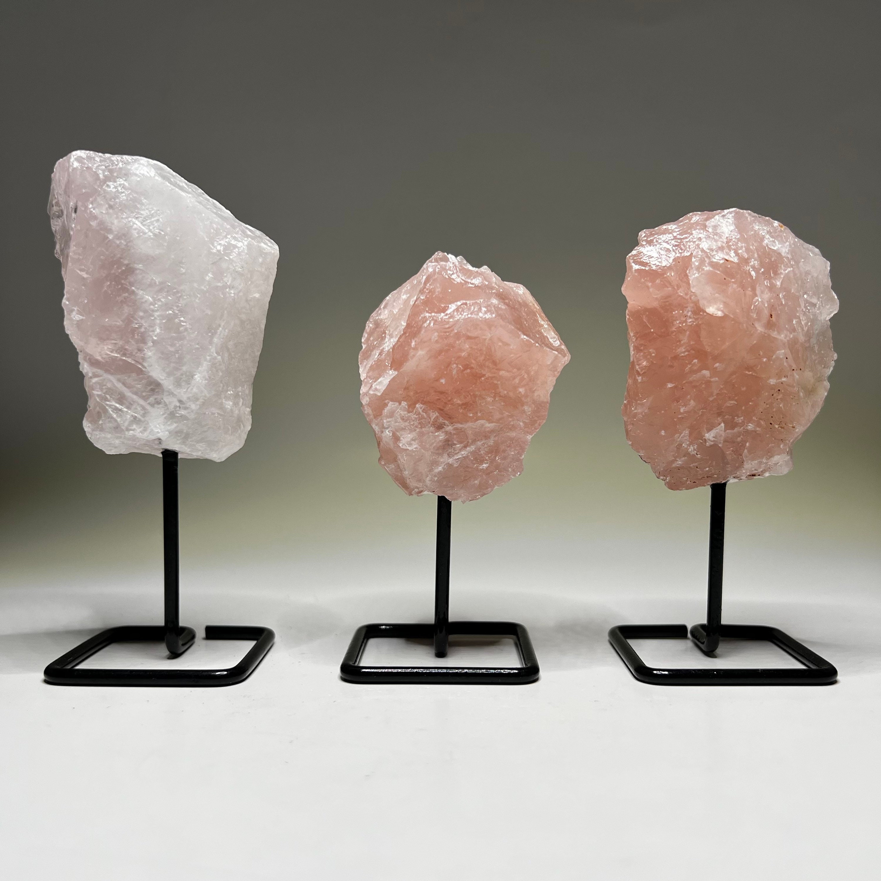 Raw Rose Quartz Crystal On Stand