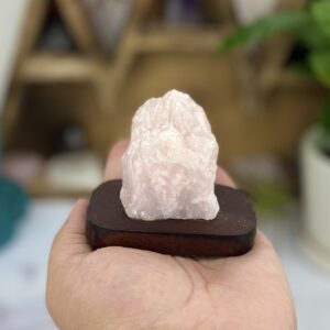Raw Rose Quartz On A Wooden Stand ( DOOAK-S22-50 ) Raw Rose Quartz On A Wooden Stand ( DOOAK-S22-50 )
