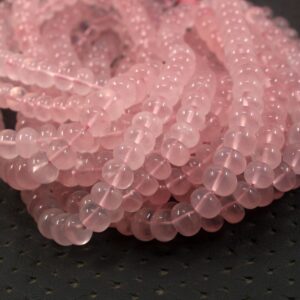 Rose Quartz Rondelle Beads: 7-8mm Smooth Gemstone Strand, 16" Rose Quartz Rondelle Beads: 7-8mm Smooth Gemstone Strand, 16"