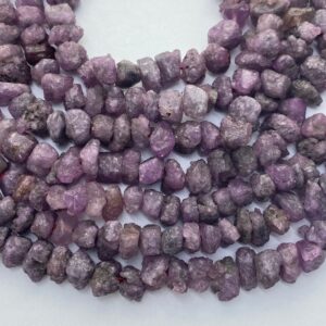 Rough Ruby gemstone nuggets. 10” strand of 7-10mm Ruby nuggets. July birthstone. Rough Ruby gemstone nuggets. 10” strand of 7-10mm Ruby nuggets. July birthstone.