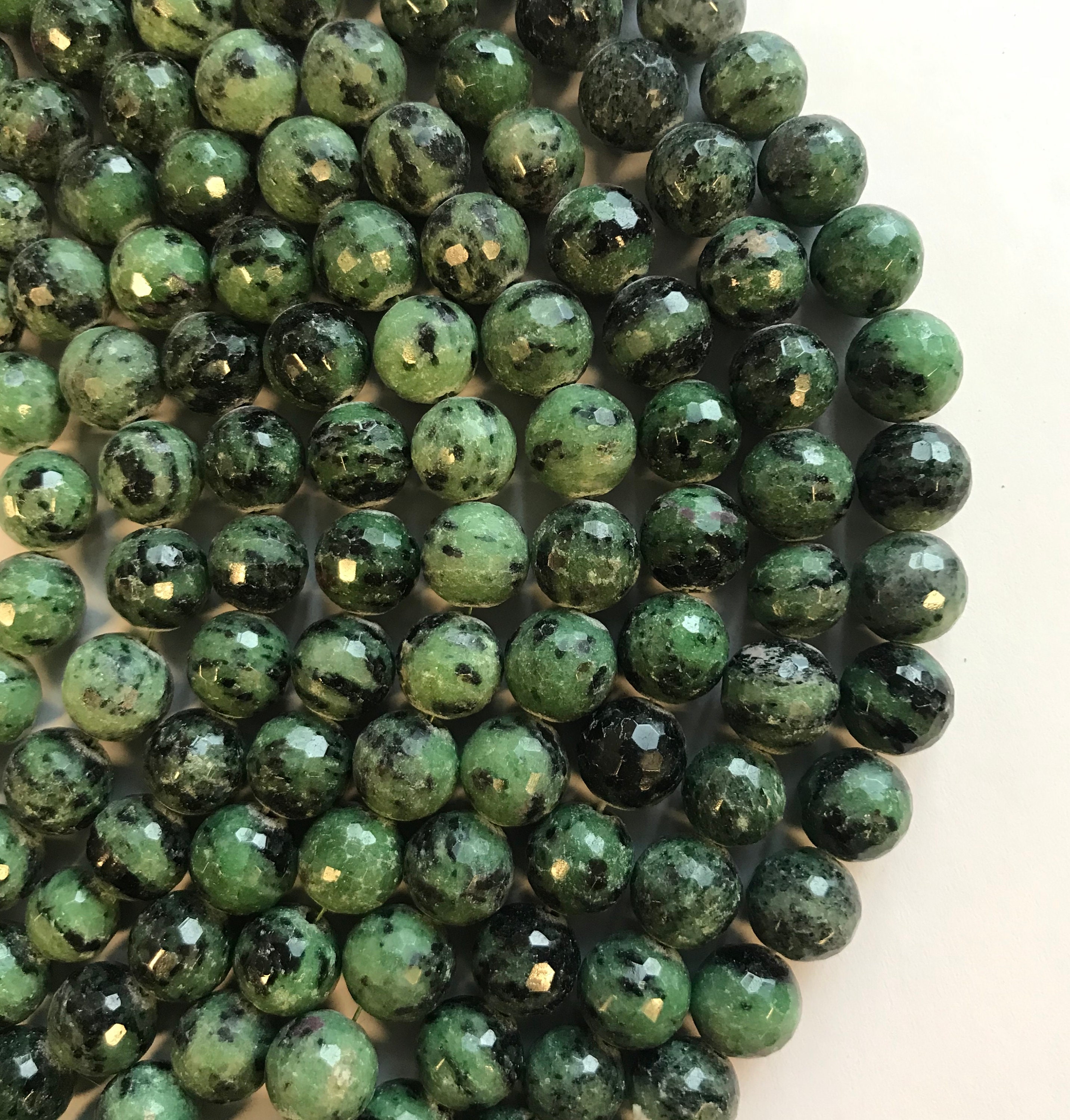 Ruby Zoisite 10mm Faceted Round Gemstone Bead -7.5 Inch Strand