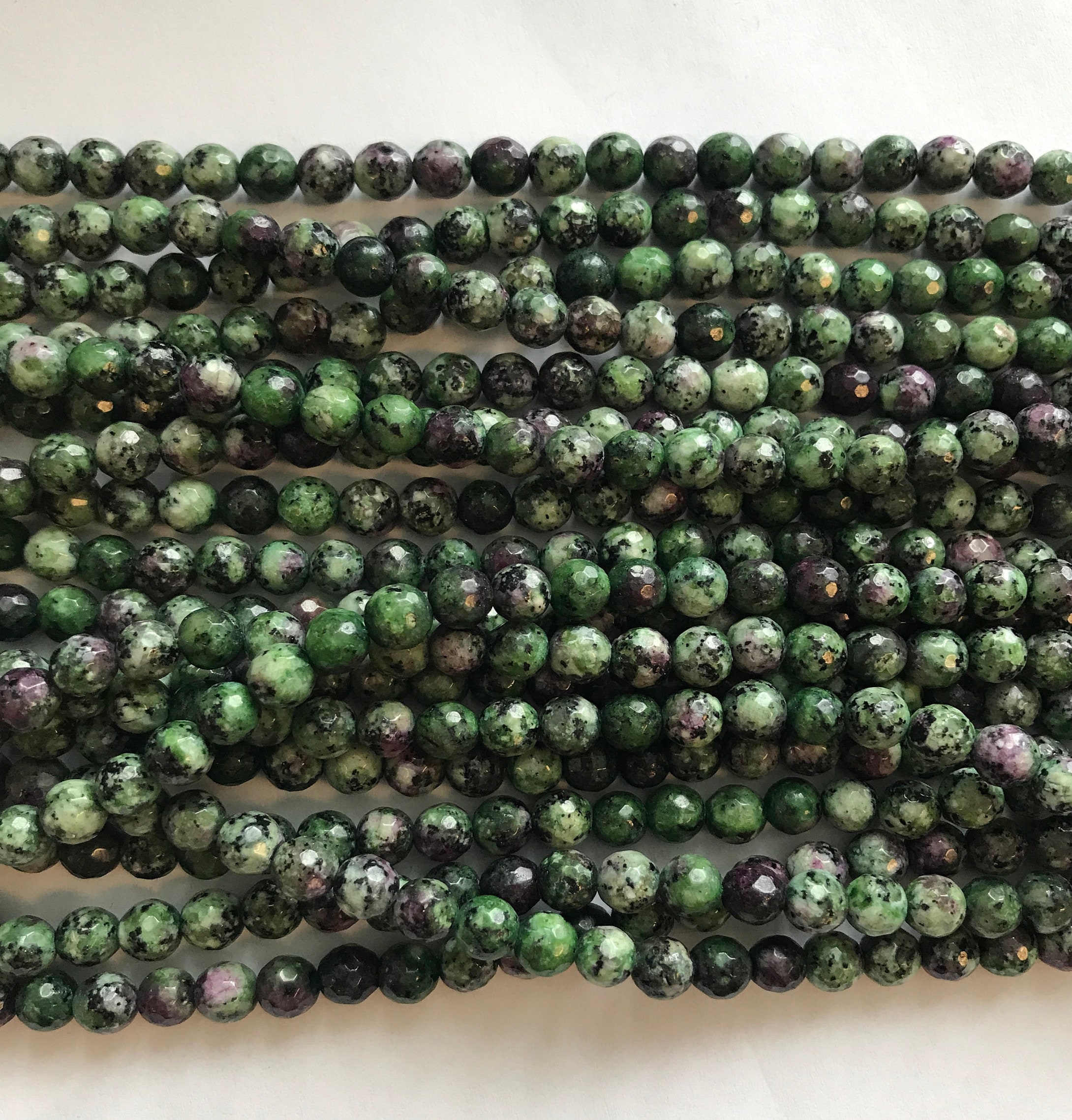 Ruby Zoisite Faceted Round 4mm 6mm 8mm 10mm 12mm Gemstone Bead -15 Inch Strand Ruby Zoisite Faceted Round 4mm 6mm 8mm 10mm 12mm Gemstone Bead -15 Inch Strand