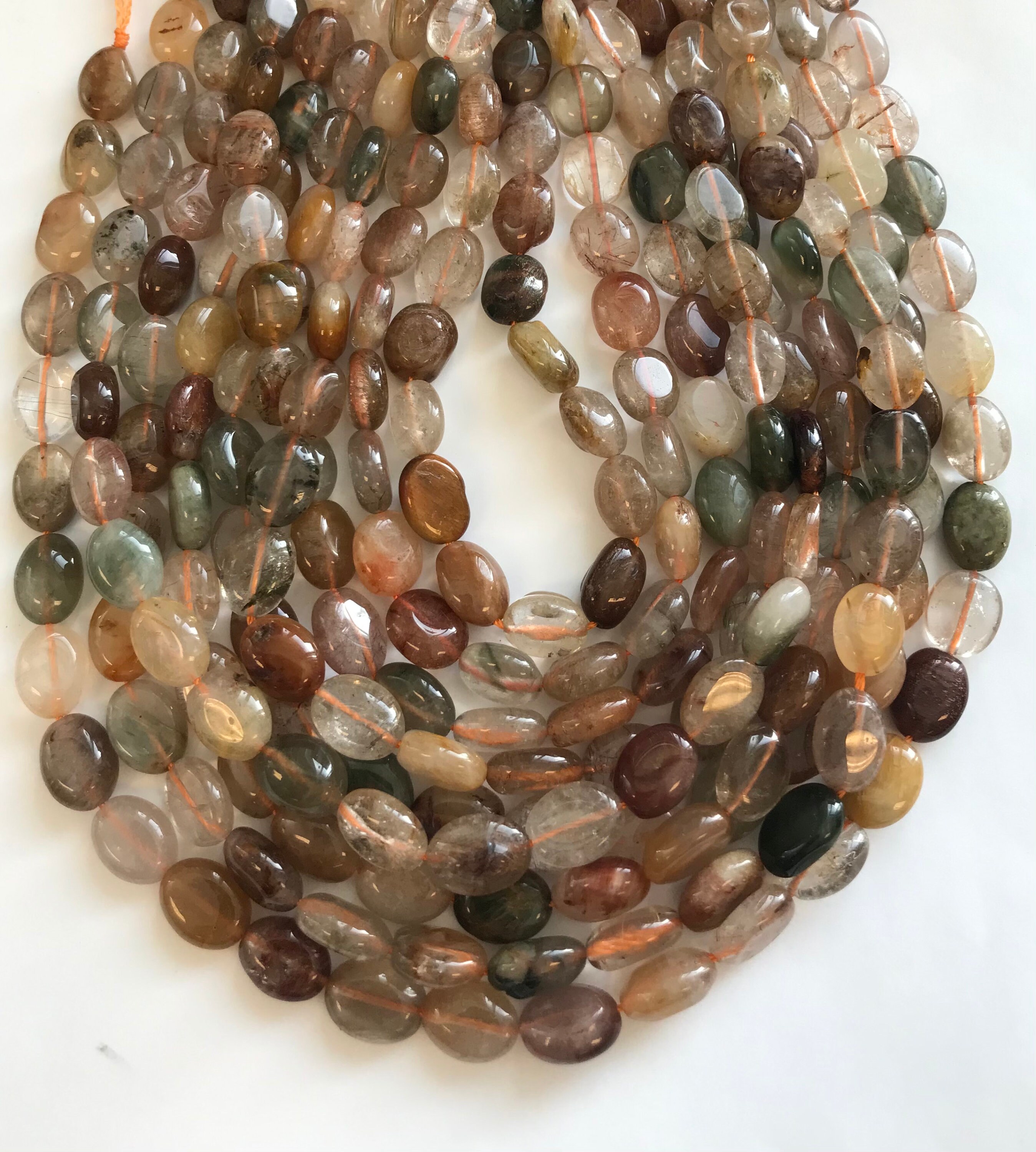 Natural Rutilated Quartz 12x8x5mm Flat Oval Natural Gemstone Beads--15.5 Inch Strand