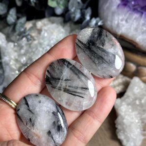Small black rutile quartz palm stone, worry stone