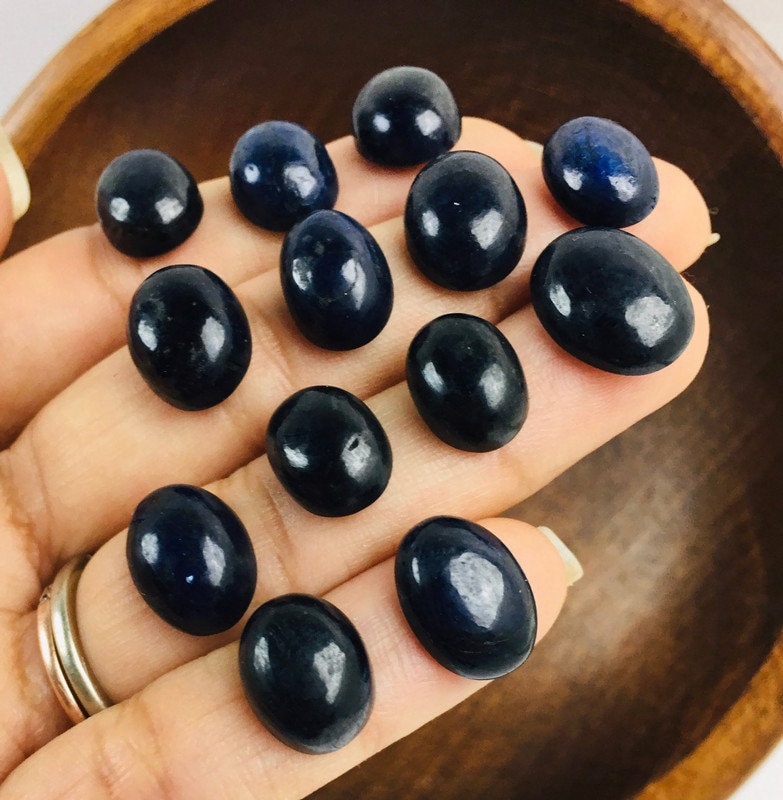 Black Blue Sapphire Crystal Cabochon: Small Polished Gemstone (12-16mm) Black Blue Sapphire Crystal Cabochon: Small Polished Gemstone (12-16mm)