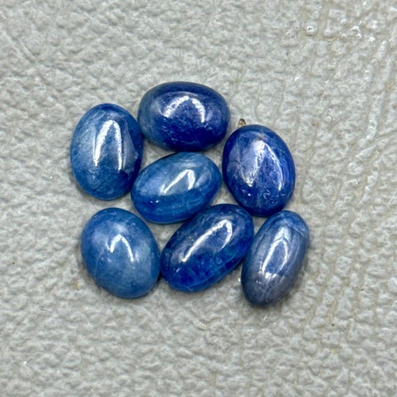 Blue Sapphire Cabochon Gemstone Lot (7 Pieces) - 27.25 Carat, 10-11mm Blue Sapphire Cabochon Gemstone Lot (7 Pieces) - 27.25 Carat, 10-11mm