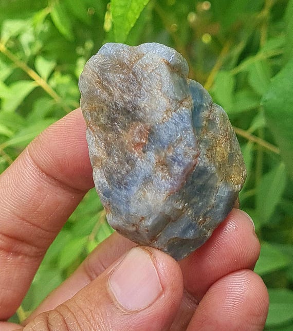 Raw Blue Sapphire Specimen: Reiki Healing Crystal (267 Ct, 44x23 Mm) Raw Blue Sapphire Specimen: Reiki Healing Crystal (267 Ct, 44x23 Mm)
