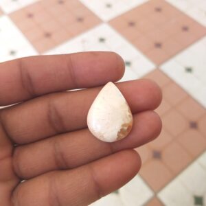 Orange Scolecite Cabochon: Pear Gemstone, 18 Carat (26x19x5 Mm) Orange Scolecite Cabochon: Pear Gemstone, 18 Carat (26x19x5 Mm)