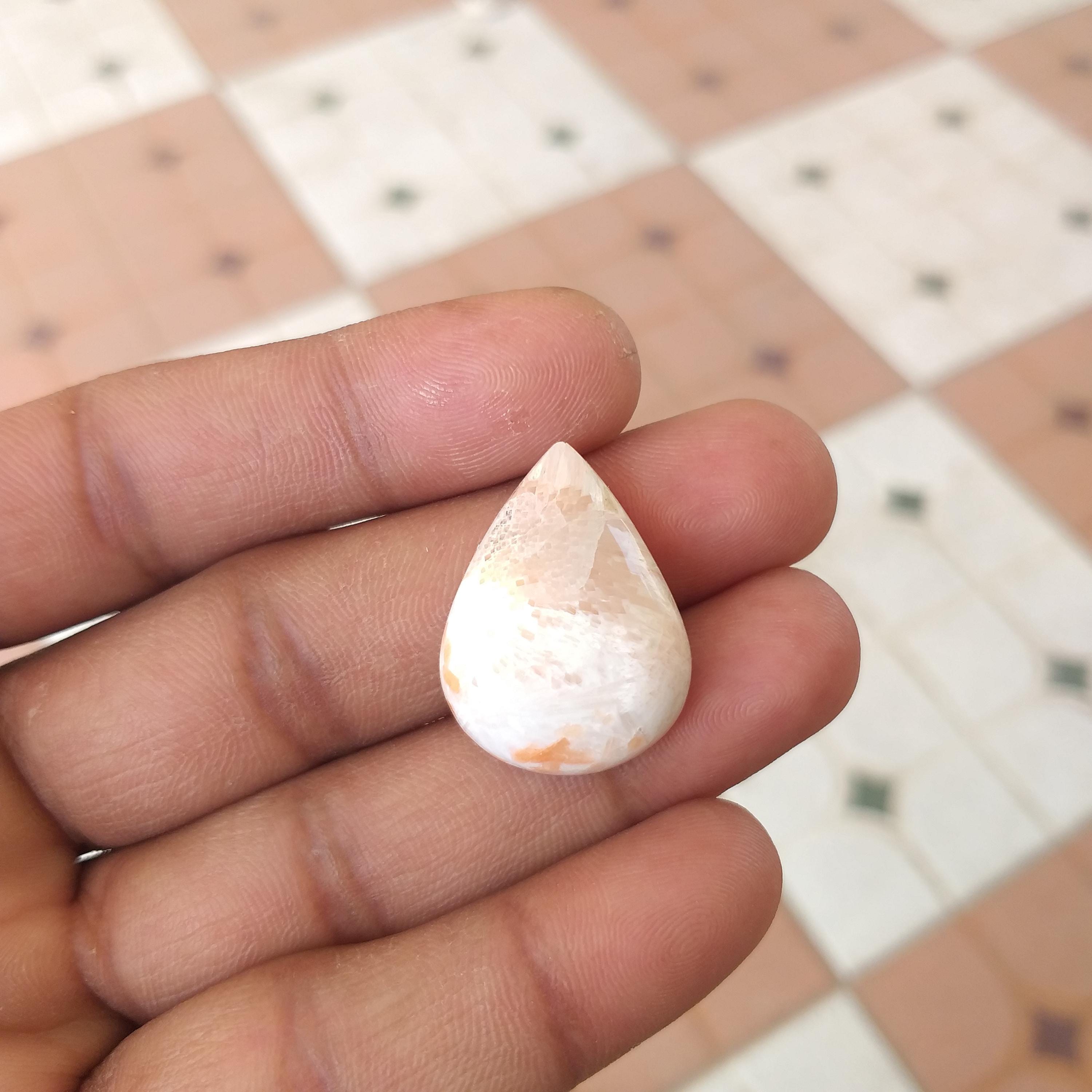 Orange Scolecite Pear Shape Cabochon: Natural Gemstone 22 Carat (27x20x7 Mm) Orange Scolecite Pear Shape Cabochon: Natural Gemstone 22 Carat (27x20x7 Mm)