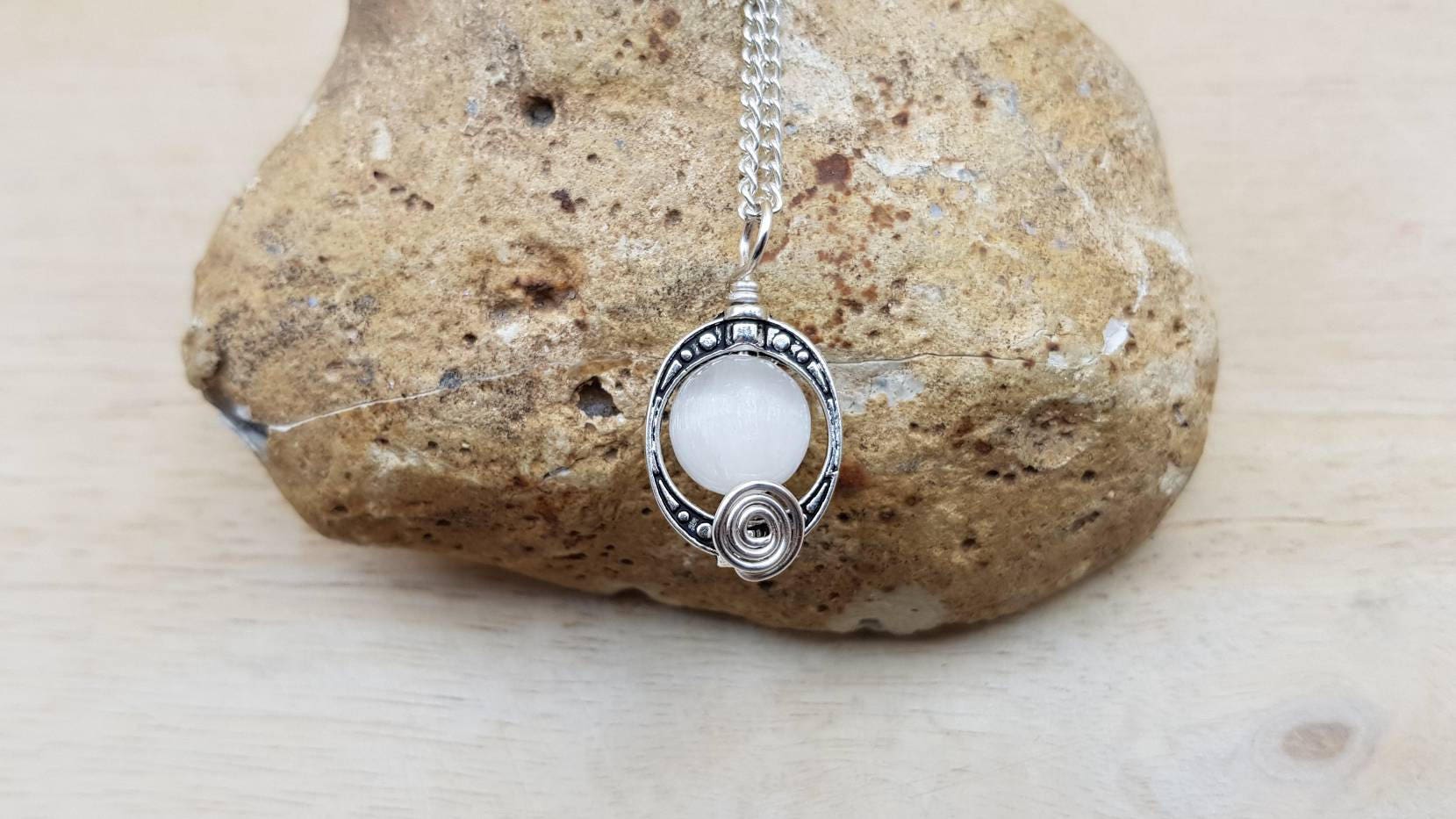 Small Selenite Pendant. Crystal Reiki Jewelry Uk. Silver Plated Oval Frame Necklace. Wire Wrap Pendant. Empowered Crystals Small Selenite Pendant. Crystal Reiki Jewelry Uk. Silver Plated Oval Frame Necklace. Wire Wrap Pendant. Empowered Crystals