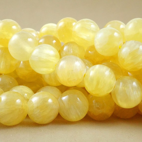 Golden Selenite Beads (round)(smooth)(6mm)(8mm)(10mm)(16"strand)
