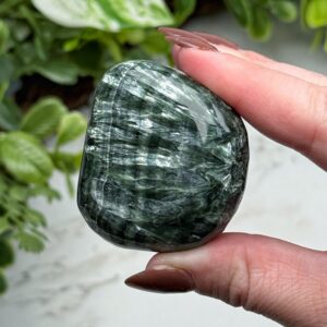 Seraphinite Palmstone , 55g , - #16 (polished Green Crystal Pocket Stone Palm, Heart Chakra, Compassion) Seraphinite Palmstone , 55g , - #16 (polished Green Crystal Pocket Stone Palm, Heart Chakra, Compassion)