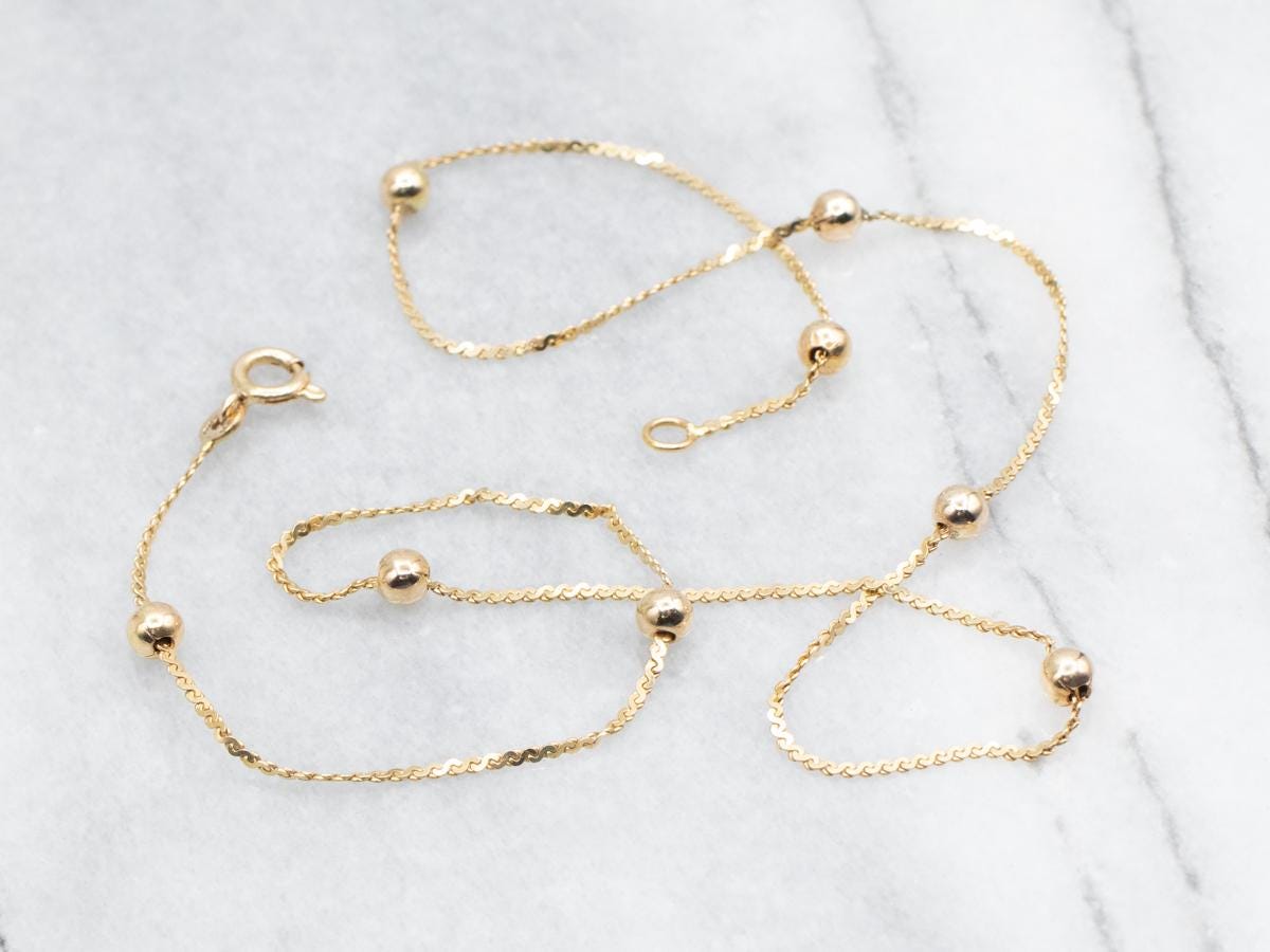 14k Yellow Gold Serpentine Bead Station Chain Necklace 14k Yellow Gold Serpentine Bead Station Chain Necklace
