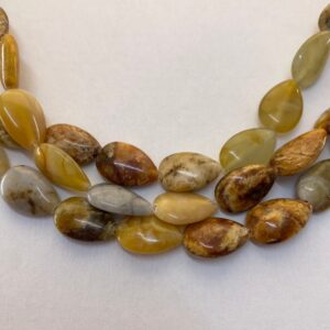 10x14mm Teardrop New Jade Gemstone Beads. 15” strand of mixed brown and yellow-green beads, 28 per strand. Rainbow Serpentine. Flower Jade. 10x14mm Teardrop New Jade Gemstone Beads. 15” strand of mixed brown and yellow-green beads, 28 per strand. Rainbow Serpentine. Flower Jade.
