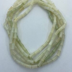 6x12mm Bamboo Shaped Serpentine Gemstone Beads. 15” strand of light green beads, about 34 per strand. Light celery green "Jade" 6x12mm Bamboo Shaped Serpentine Gemstone Beads. 15” strand of light green beads, about 34 per strand. Light celery green "Jade"