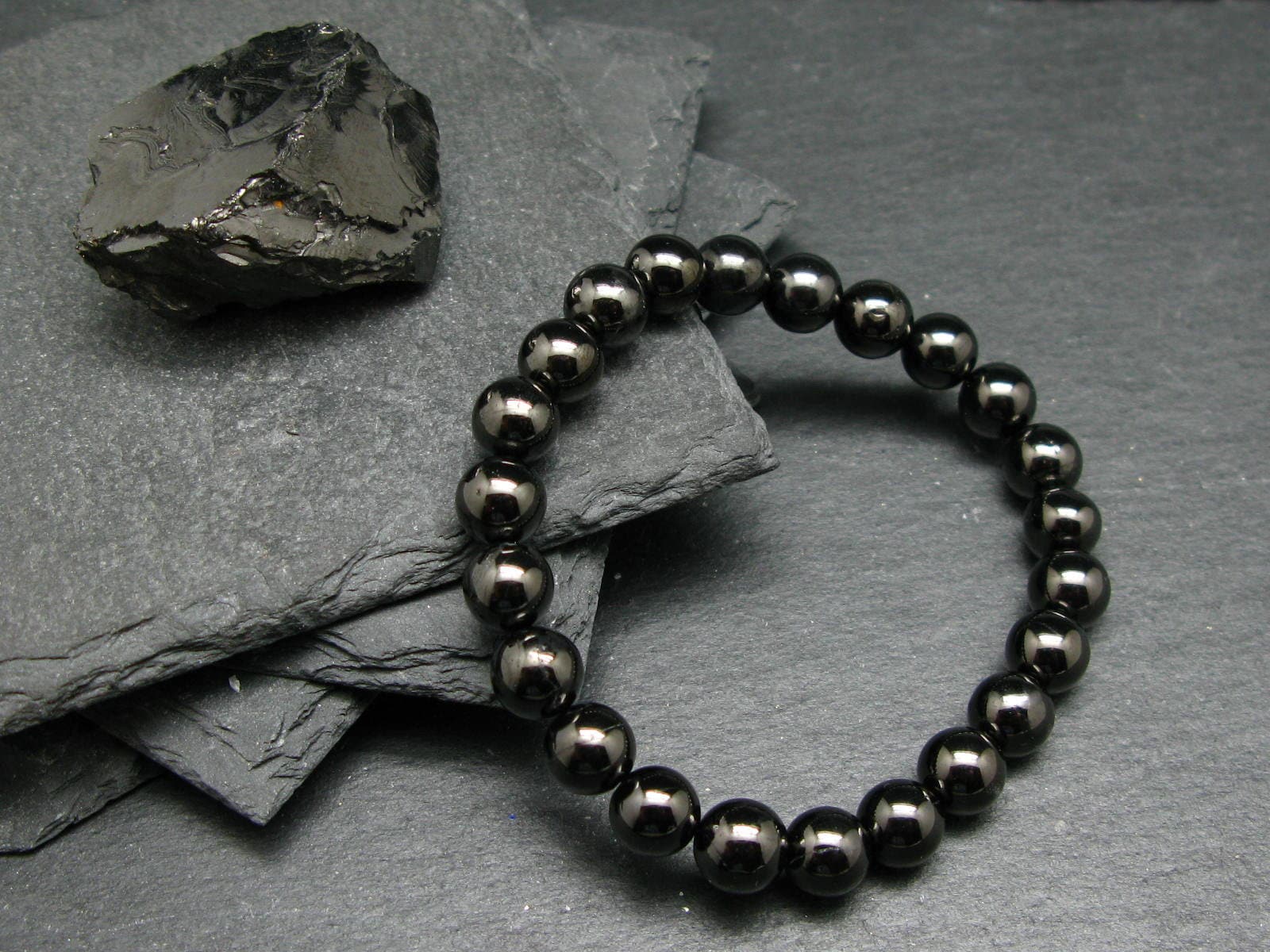 Elite Noble Shungite Genuine Bracelet ~ 7 Inches ~ 8mm Round Beads Elite Noble Shungite Genuine Bracelet ~ 7 Inches ~ 8mm Round Beads