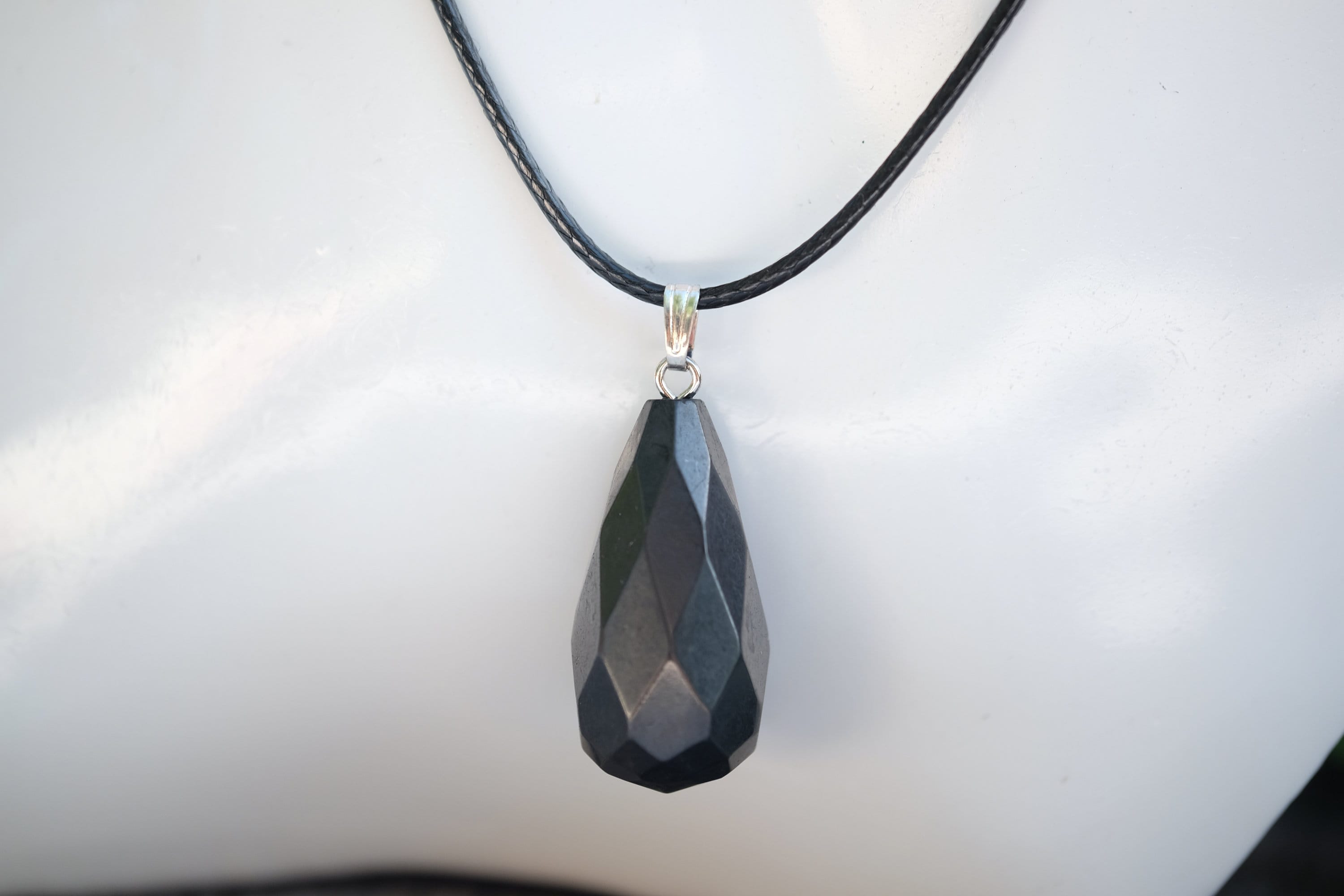 Shungite 1.25in. Faceted Tear Drop Pendant With Optional 925 Italy Sterling Silver Or Black Cord Necklace Shungite 1.25in. Faceted Tear Drop Pendant With Optional 925 Italy Sterling Silver Or Black Cord Necklace