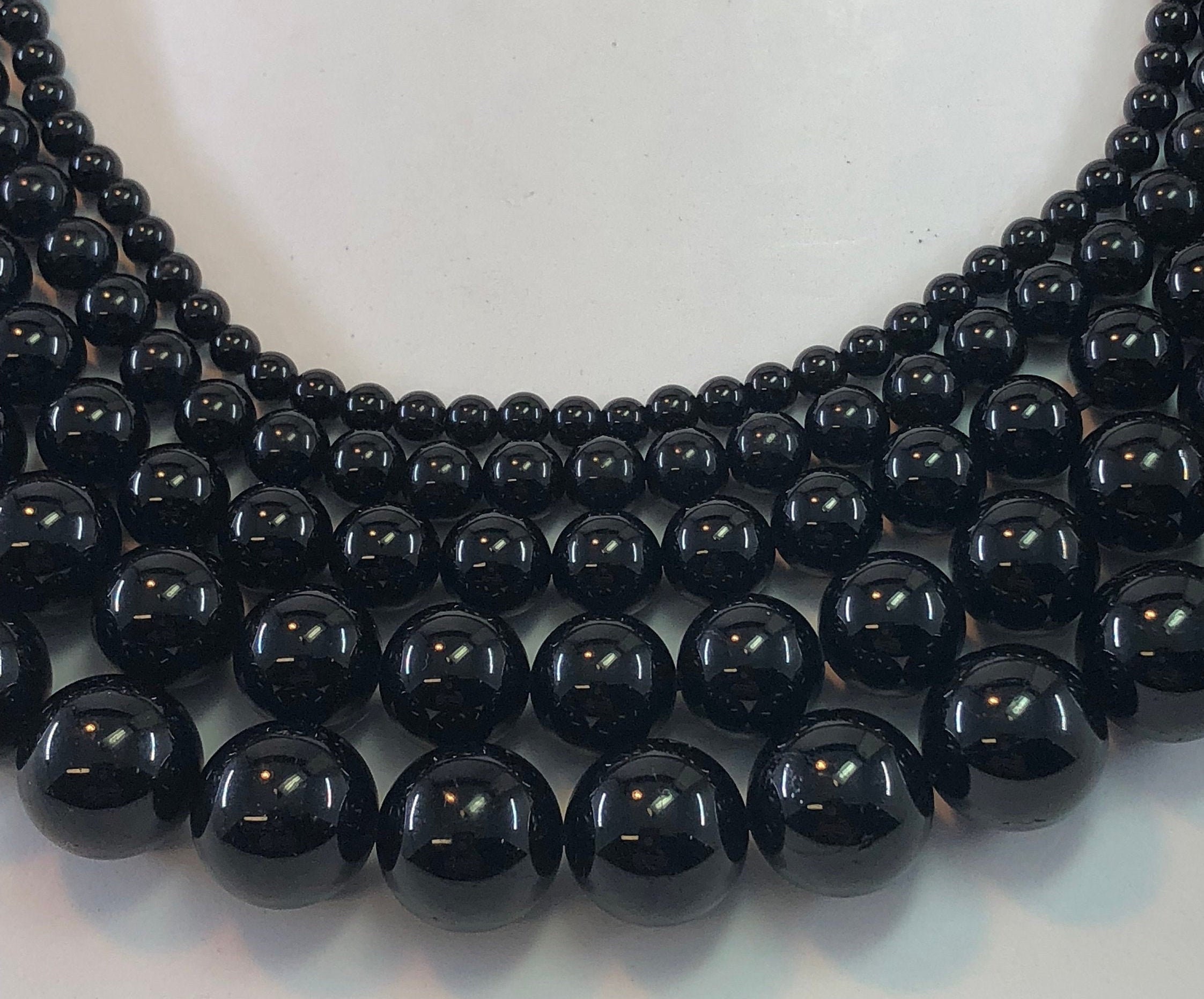 Black Shungite Gemstone Beads. Available In 4-10mm Round Beads On 15 Inch Strand. Ancient Rock Thought To Be 2 Billion Yrs. Old.