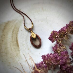 Oval shaped Smokey Quartz macramé necklace with brass charms
