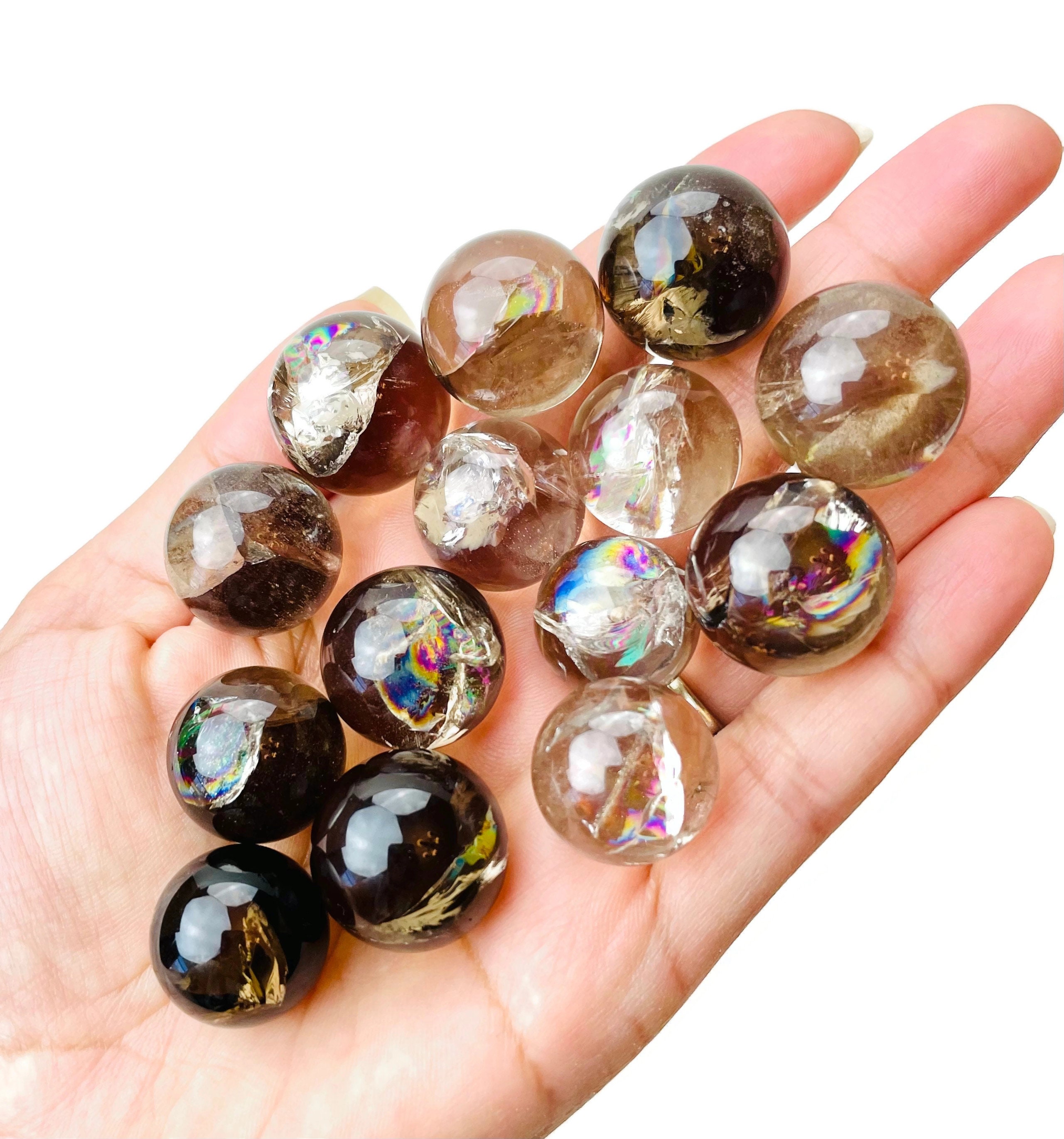Smoky Quartz Crystal Sphere: Mini Tumbled Orb With Rainbow Inclusions Smoky Quartz Crystal Sphere: Mini Tumbled Orb With Rainbow Inclusions