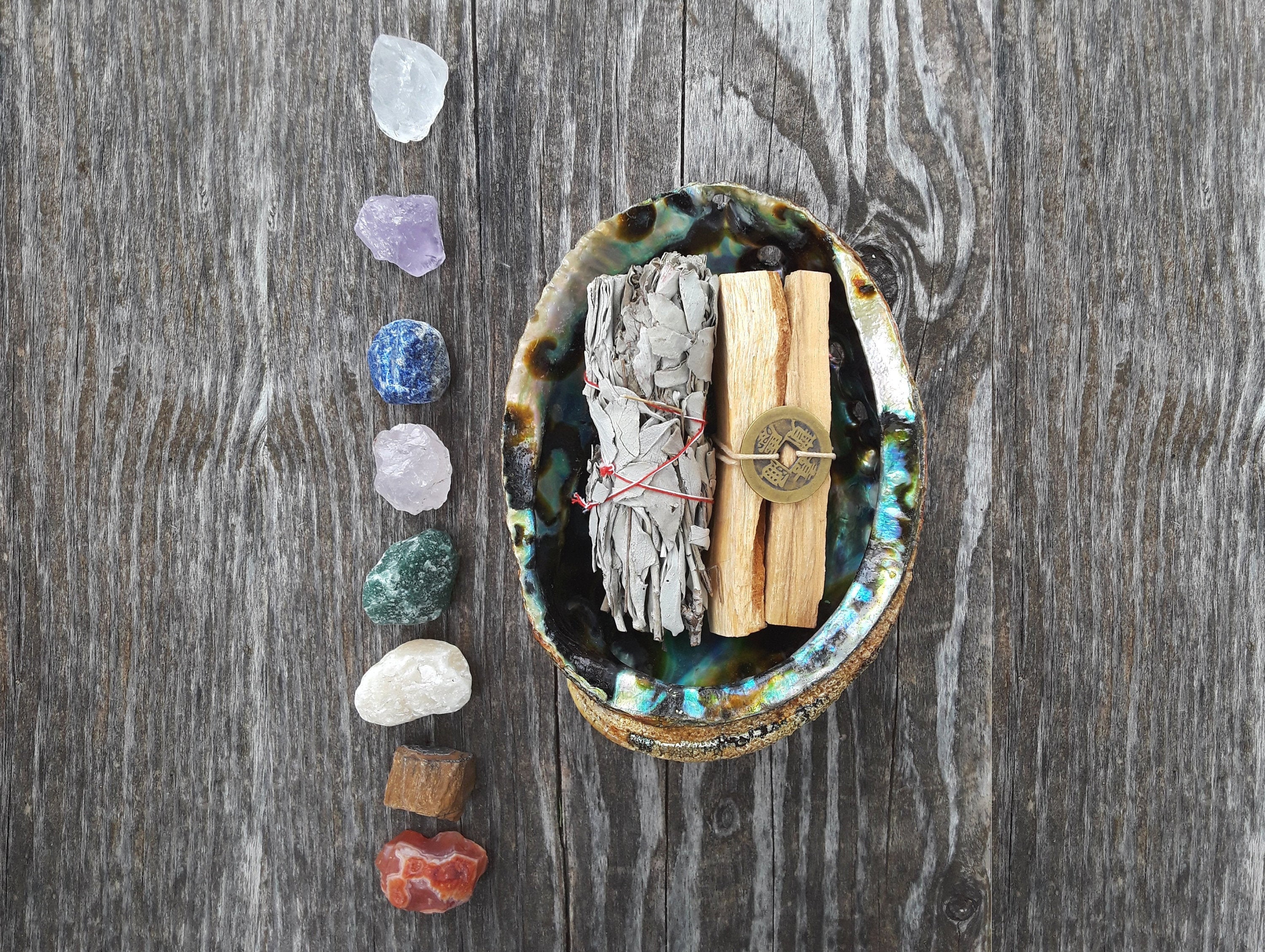 Palo Santo White Sage Healing Smudge Kit. Choose From 8 Crystals With Large Abalone Shell, White Sage, 3 Palo Santo And A I Ching Coin. Palo Santo White Sage Healing Smudge Kit. Choose From 8 Crystals With Large Abalone Shell, White Sage, 3 Palo Santo And A I Ching Coin.
