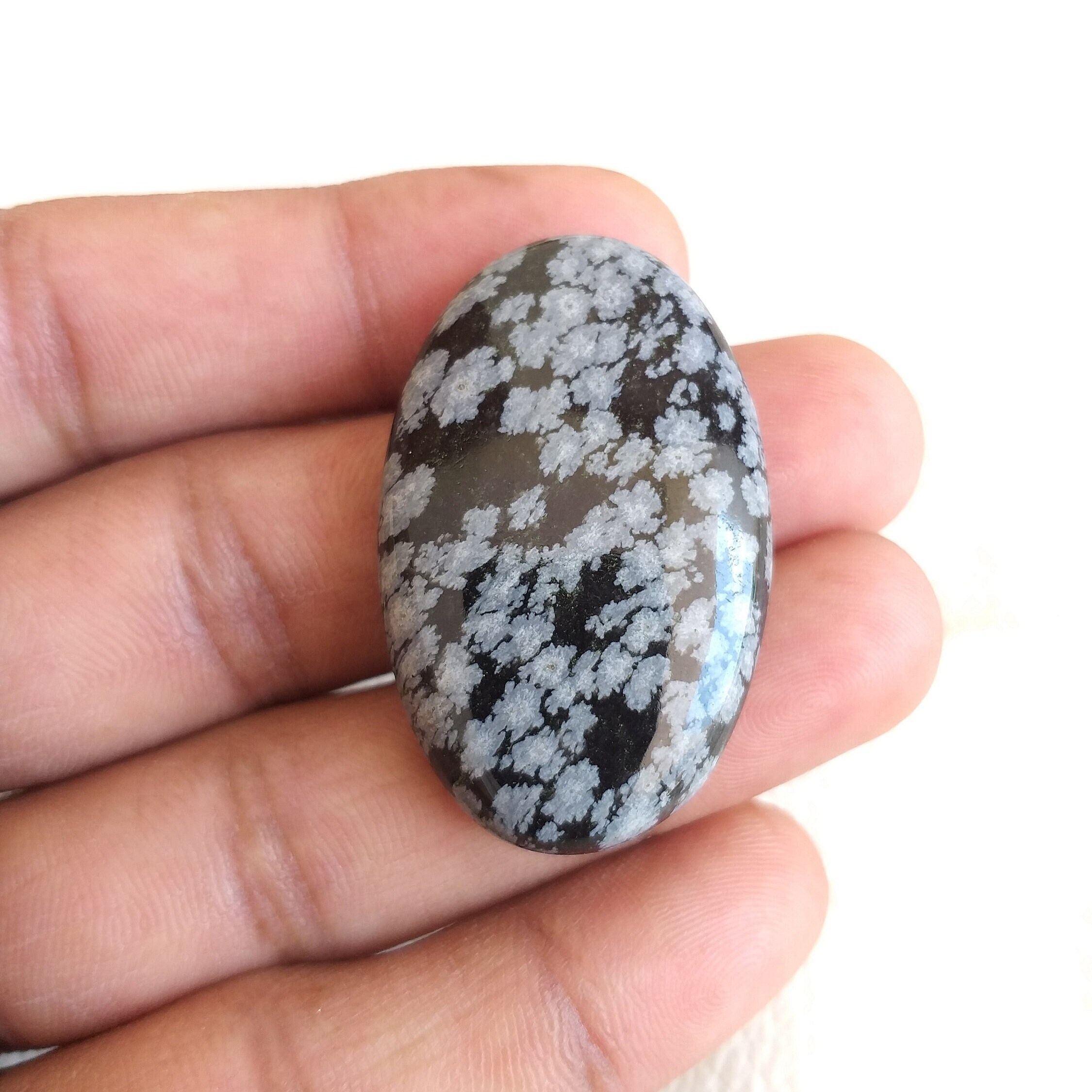 Oval Snowflake Obsidian Cabochon: Polished Gemstone For Pendant (41x26x7 Mm, 55.3 Carat Oval Snowflake Obsidian Cabochon: Polished Gemstone For Pendant (41x26x7 Mm, 55.3 Carat