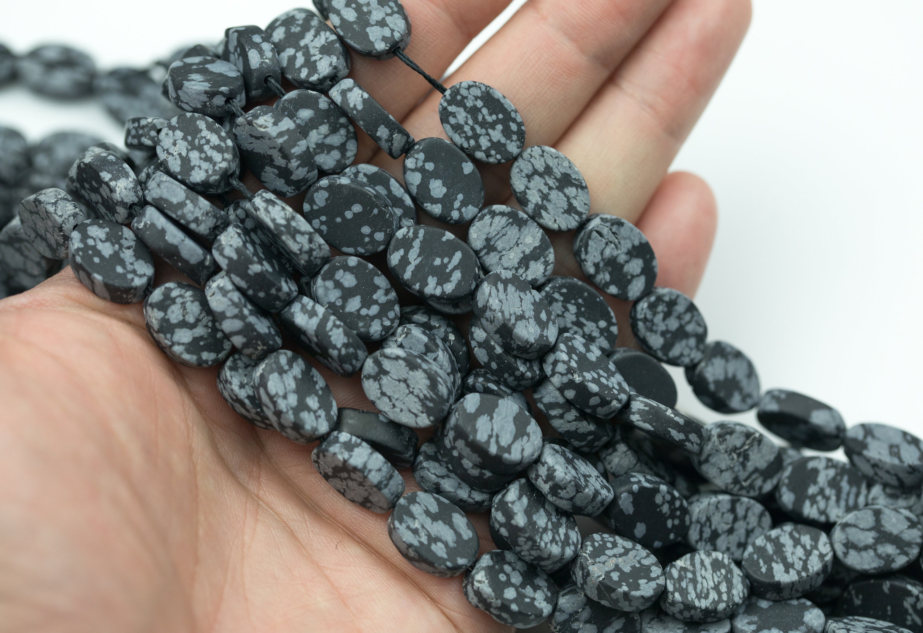Natural Snowflake Obsidian Matte Oval Beads Snowflake Obsidian Beads - Oval Shaped 14x10mm - 1 Strand ~15.5" - Special Exclusive Item Natural Snowflake Obsidian Matte Oval Beads Snowflake Obsidian Beads - Oval Shaped 14x10mm - 1 Strand ~15.5" - Special Exclusive Item