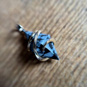Faceted snowflake obsidian in 14k gold pendant