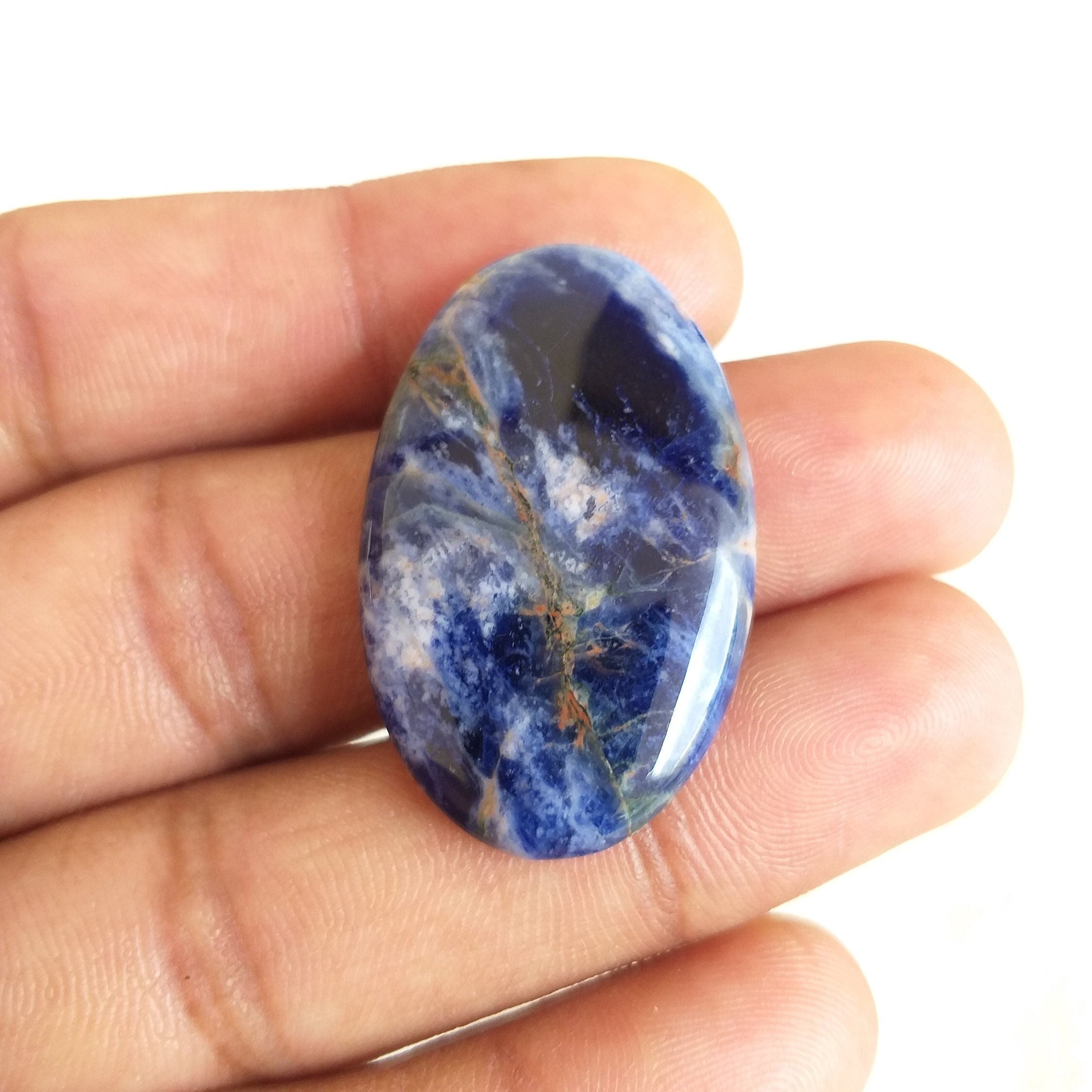Oval Sodalite Cabochon: 27.5 Carat Gemstone, 36x22x5 Mm Oval Sodalite Cabochon: 27.5 Carat Gemstone, 36x22x5 Mm