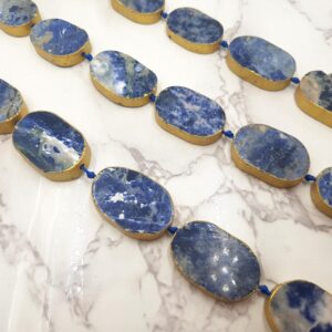 Sodalite Oval Bezel Slab Gold Leaf Edge Beads Approx 20x30mm 15.5" Strand Sodalite Oval Bezel Slab Gold Leaf Edge Beads Approx 20x30mm 15.5" Strand