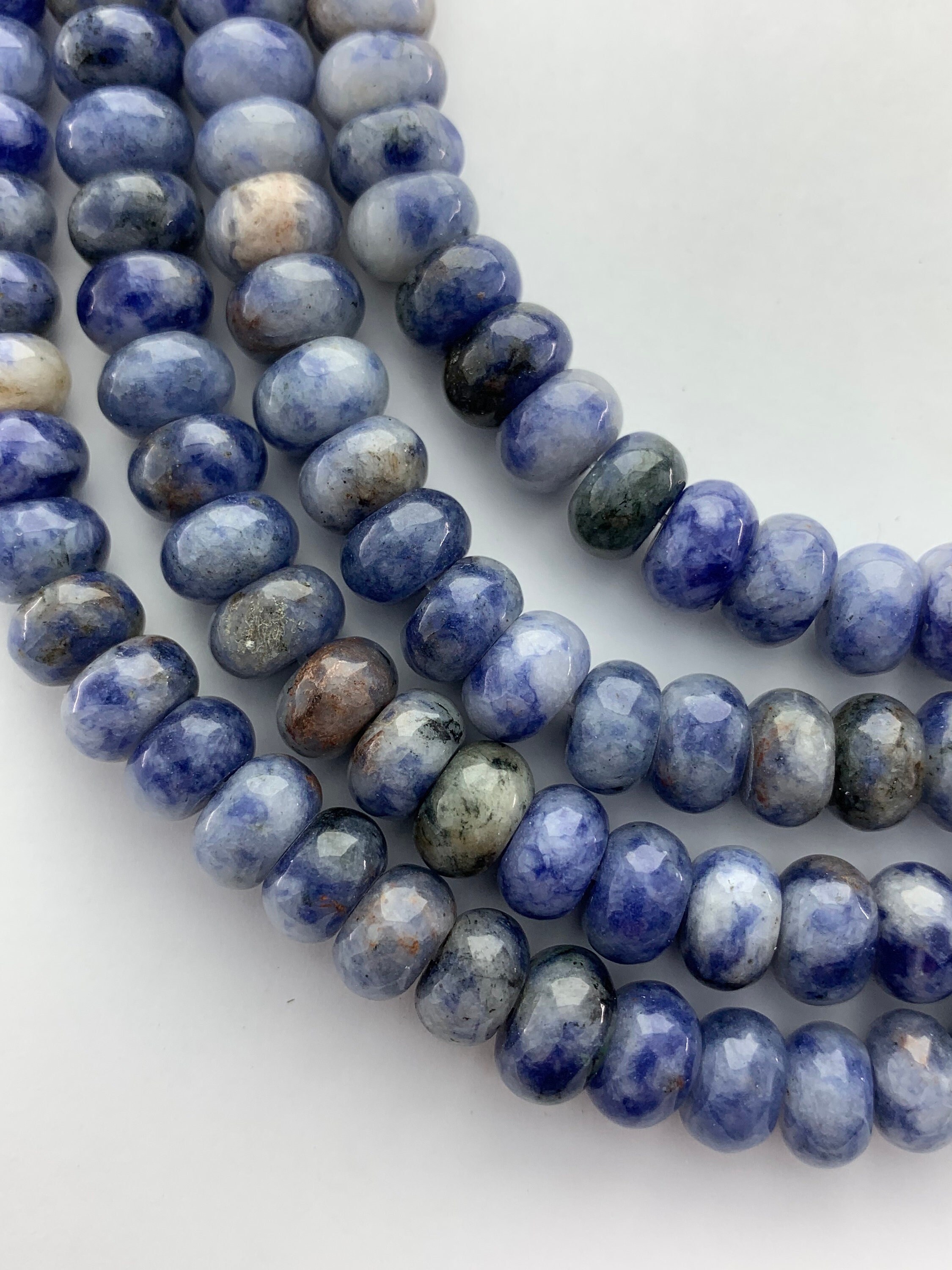 8mm Rondelle African Sodalite Gemstone Beads. 15" Strand Of High Quality 5x8mm Blue And White Beads, About 74 Per Strand. 8mm Rondelle African Sodalite Gemstone Beads. 15" Strand Of High Quality 5x8mm Blue And White Beads, About 74 Per Strand.
