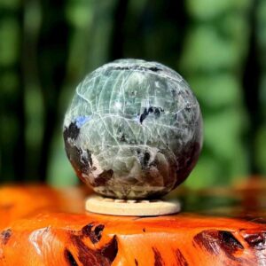Green Sodalite sphere w/ stand - UV reactive - aka Hackmanite - rare crystal Green Sodalite sphere w/ stand - UV reactive - aka Hackmanite - rare crystal