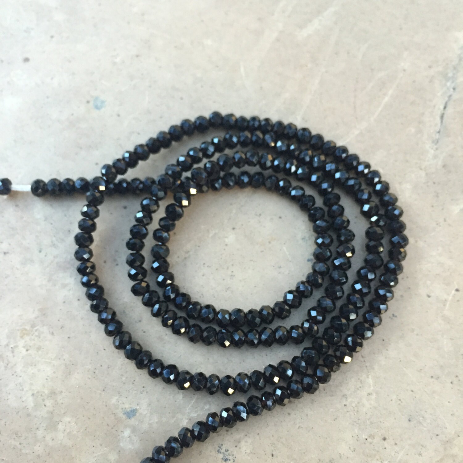 Black Spinel Faceted Rondelles, 2.5 Mm, 16 Inch Strand Black Spinel Faceted Rondelles, 2.5 Mm, 16 Inch Strand