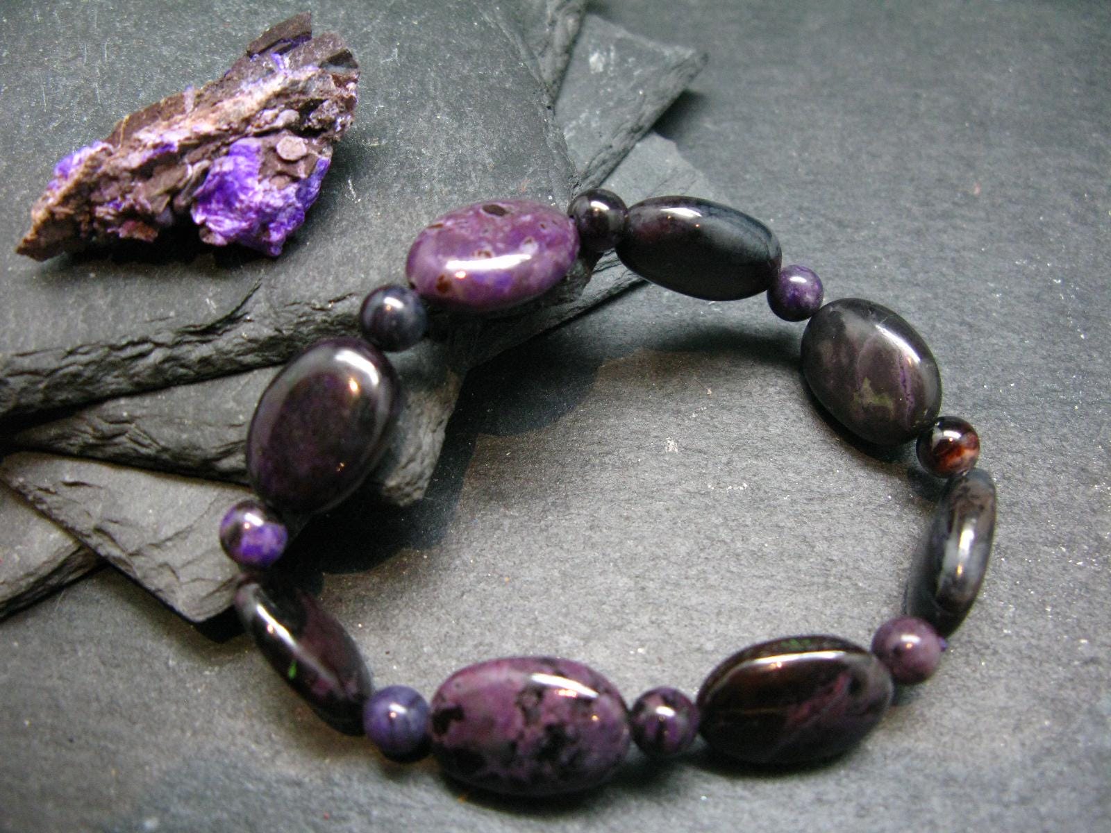 Sugilite Genuine Bracelet ~ 7 Inches ~ 16mm Oval Beads Sugilite Genuine Bracelet ~ 7 Inches ~ 16mm Oval Beads